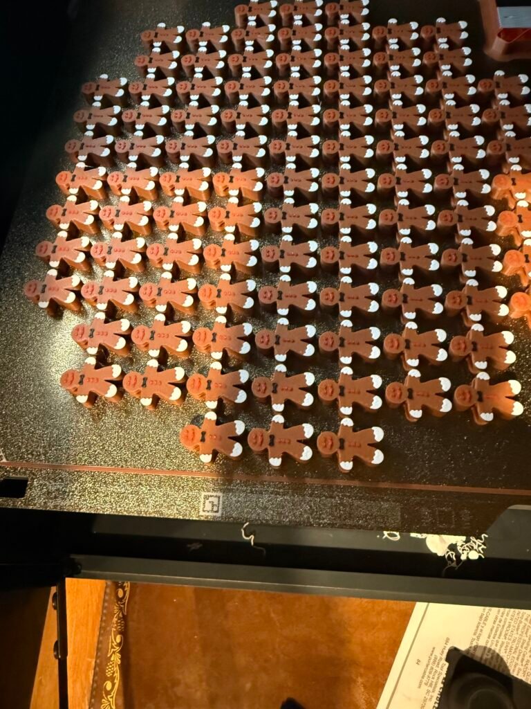 Gingerbread man beads on a textured PEI plate.