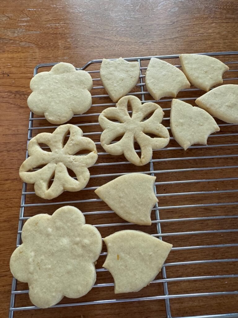 More images of flower shaped cookies made from graduated flower cookie cutters.