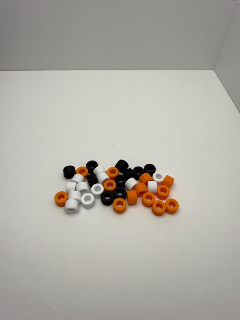Fall beads, orange, black and white.