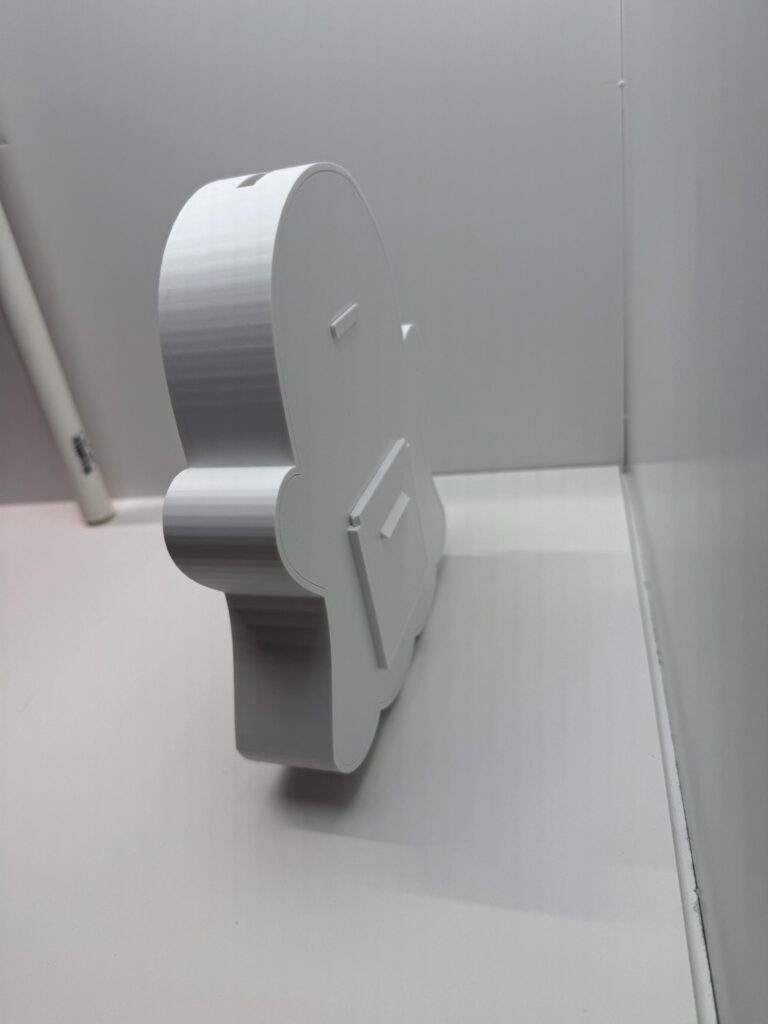 Ghost type piggy bank side profile.