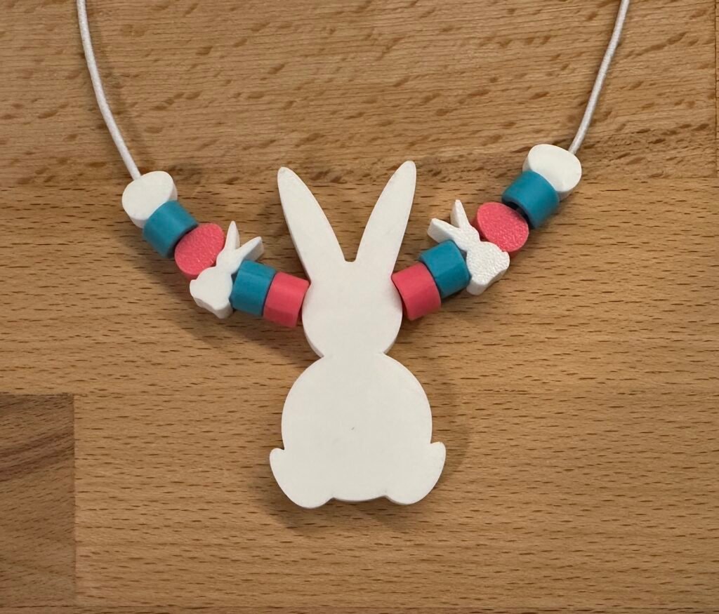 Easter necklace kit with large bunny centerpiece.
