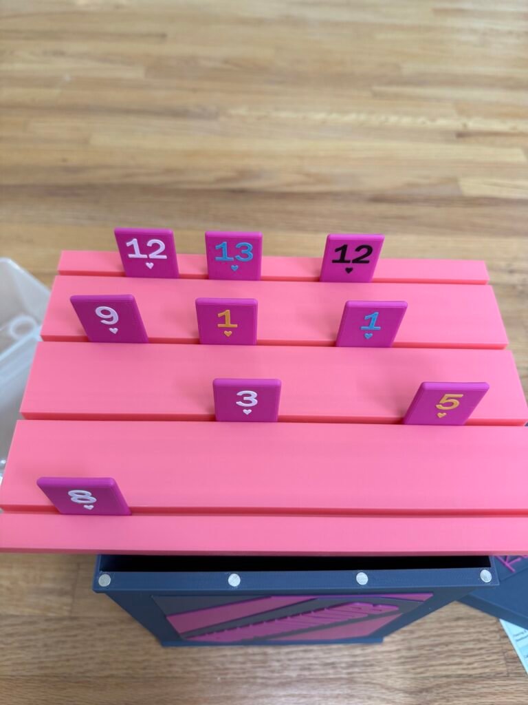 Rummikub boards example, pink with magenta pieces.