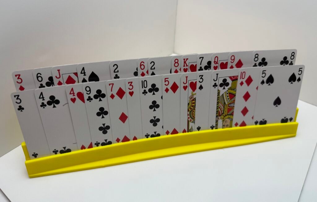 Two row, tiered card holder, holds 40+ cards.